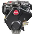 A close-up view of an engine with red and black components against white background.