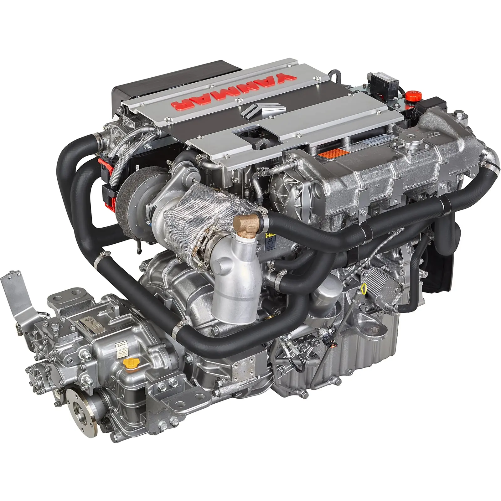 A silver engine with black hoses and components.