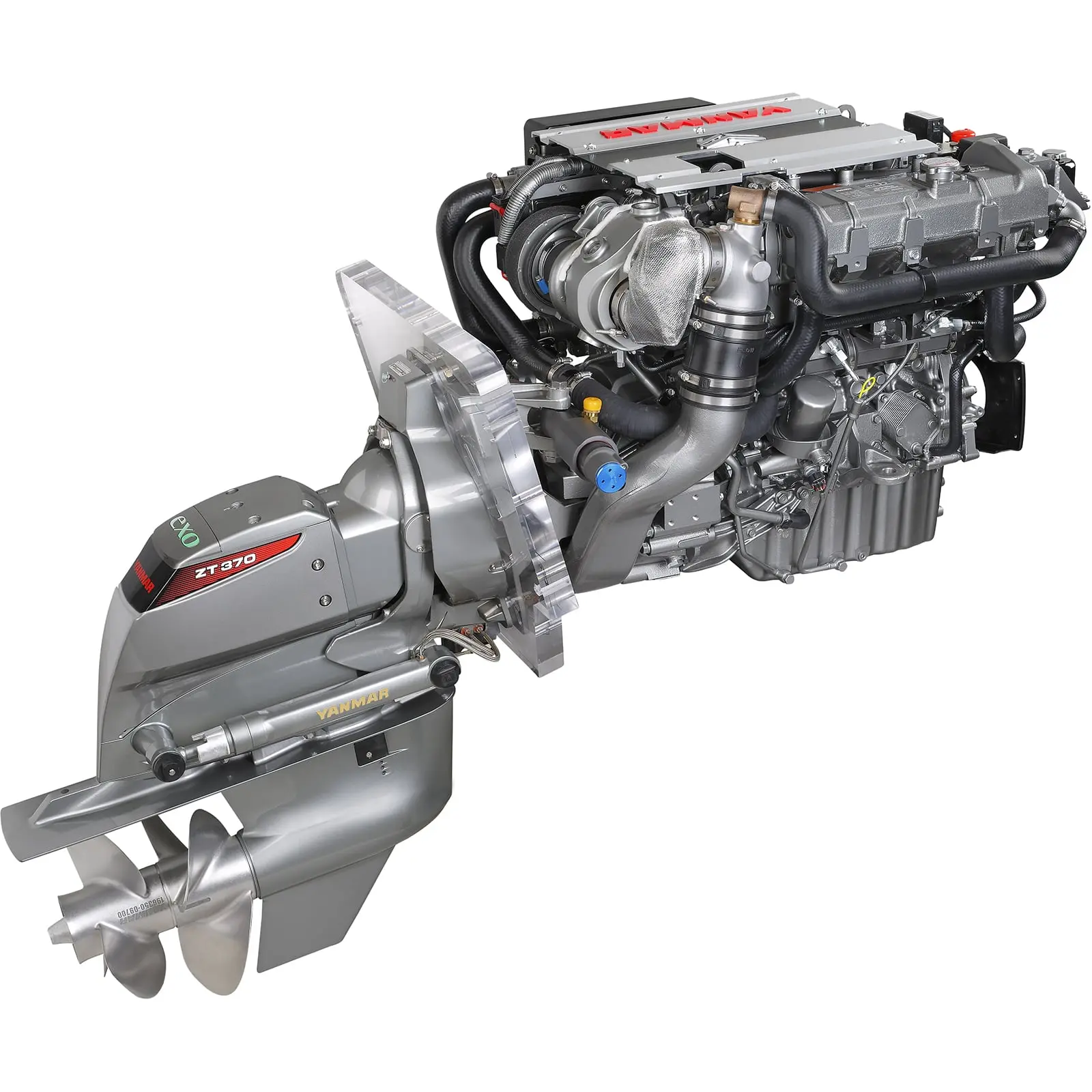 A silver marine engine with propeller and exhaust components.