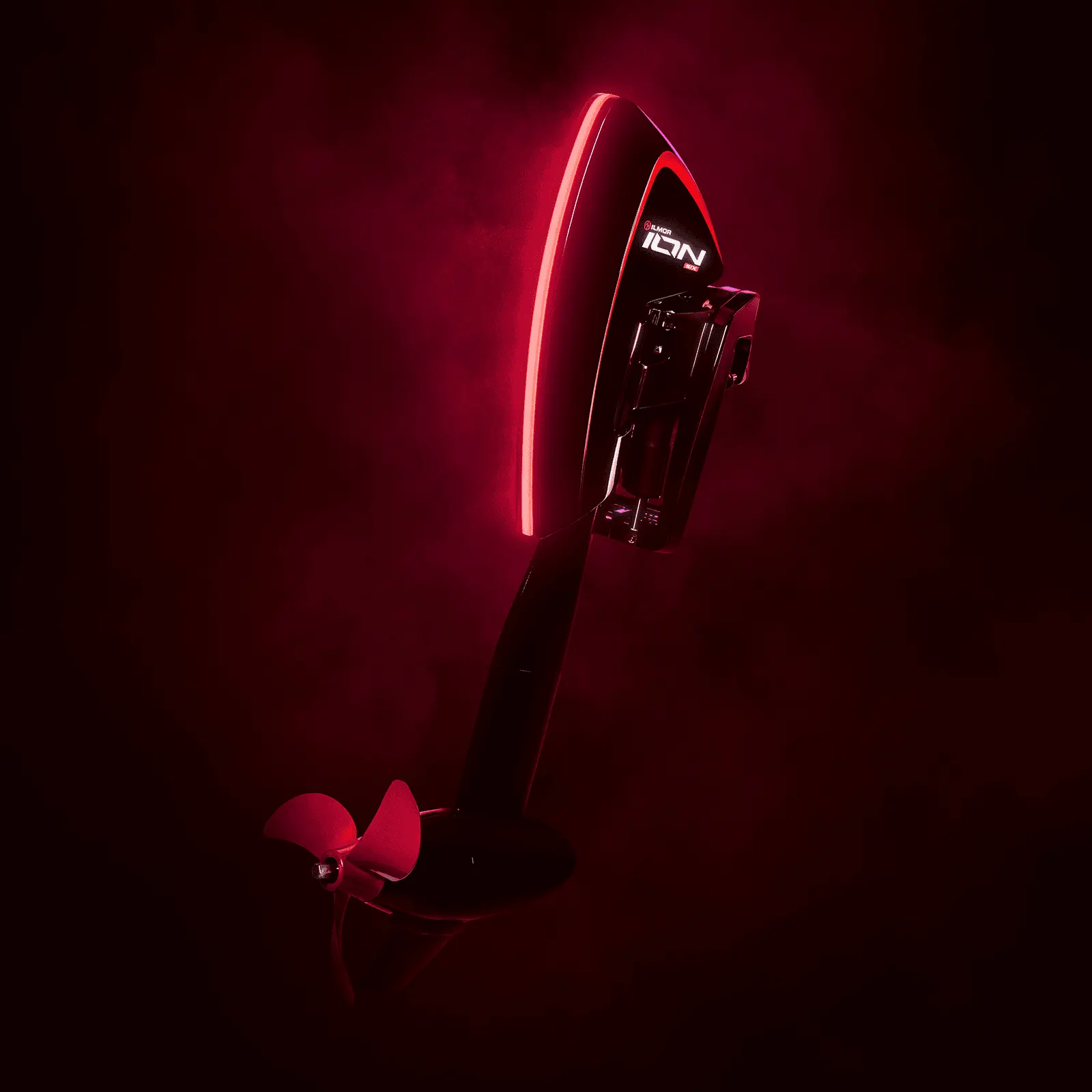 Ilmor ION electric outboard lit red on a dark background