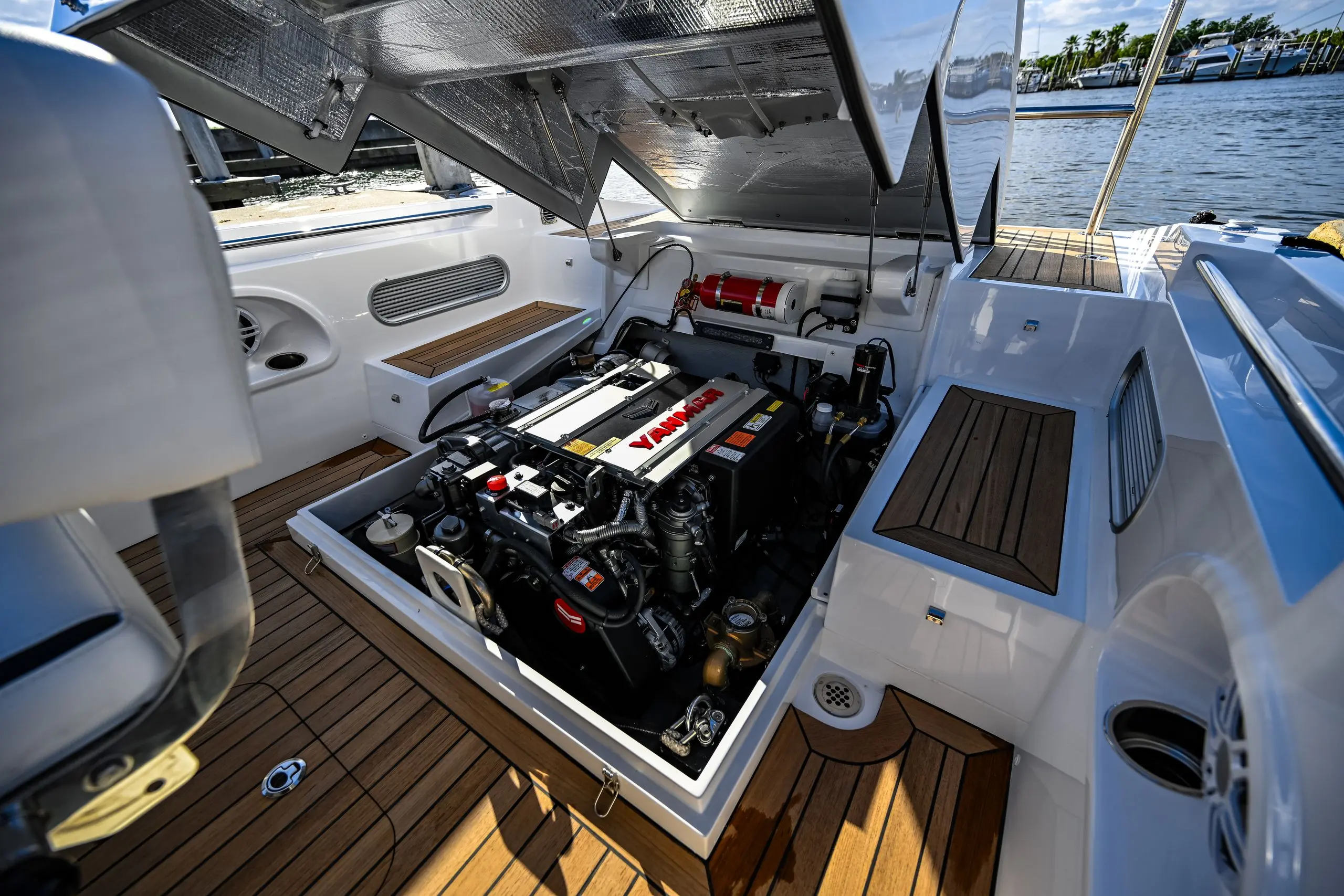 YANMAR marine diesel newly installed in an open engine hatch at a Florida marina